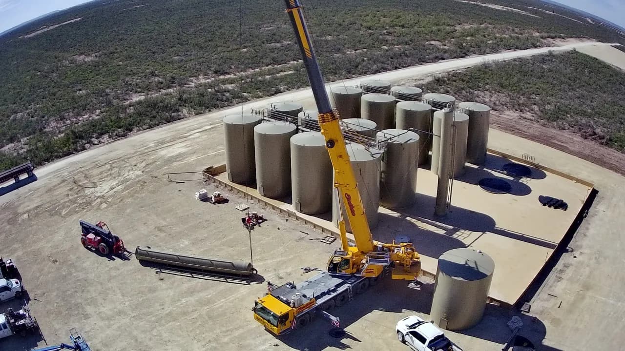 Viking crane setting tank battery vessels on location